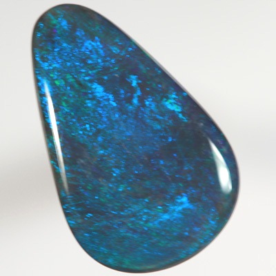 SOLID BLACK OPAL Bright green, turquoise and blue always showing SEE VIDEO